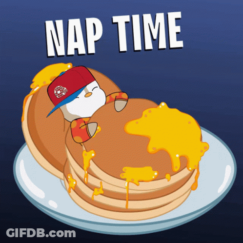 A Cartoon Of A Penguin Sleeping On A Stack Of Pancakes With The Words Nap Time Below It GIF
