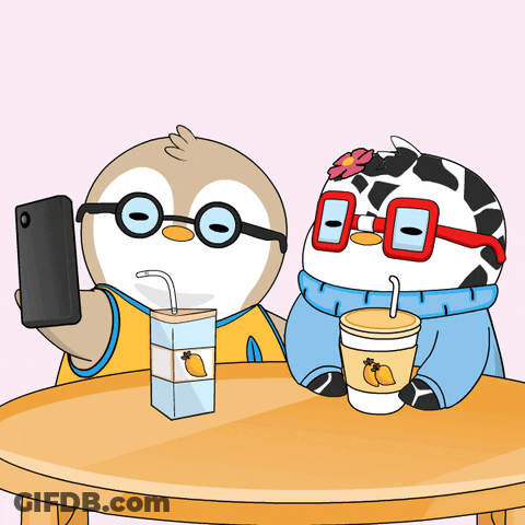 A Cartoon Of A Penguin Taking A Selfie Next To A Cow Wearing Glasses GIF