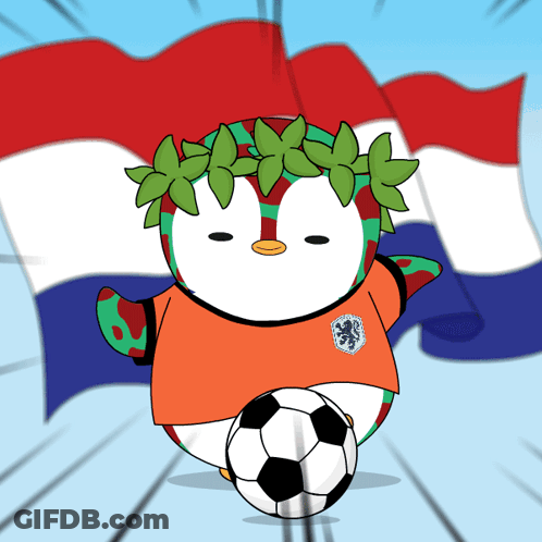 A Cartoon Of A Penguin Wearing An Orange Jersey With A Lion On It Kicking A Soccer Ball GIF