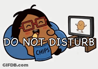 A Cartoon Of A Potato Eating Chips And Watching Tv GIF
