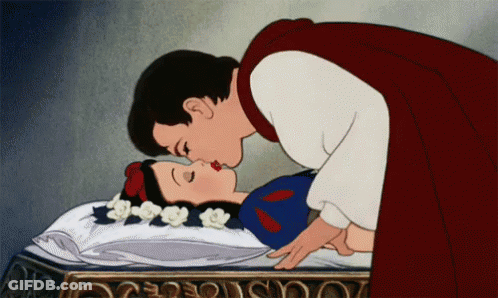 A Cartoon Of A Prince Kissing Snow White While She Is Sleeping GIF