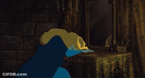 A Cartoon Of A Princess In A Blue Dress GIF