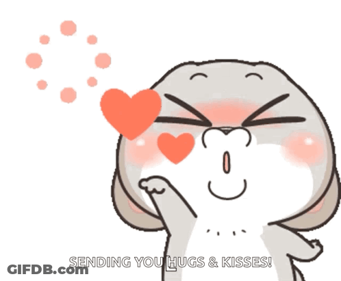 A Cartoon Of A Rabbit Blowing A Heart With The Words " Sending You Hugs & Kisses " Below It GIF