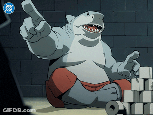 A Cartoon Of A Shark With A Dc Logo On The Bottom Right GIF