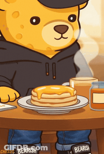 A Cartoon Of A Teddy Bear Sitting At A Table With Pancakes On It GIF