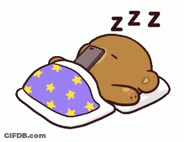A Cartoon Of A Teddy Bear Sleeping On A Bed With A Cell Phone On Its Head . GIF