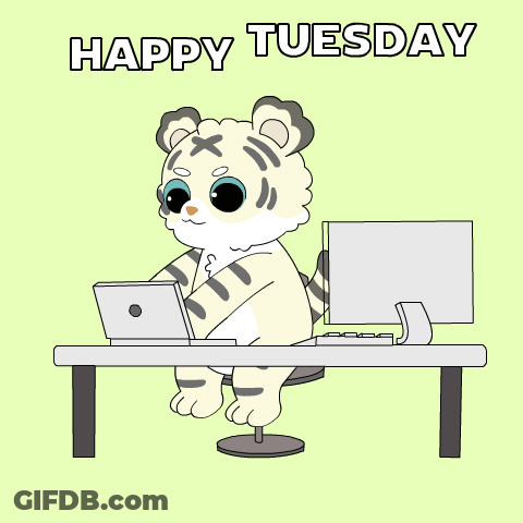 A Cartoon Of A Tiger Sitting At A Desk With A Laptop And A Computer With The Words Happy Tuesday Below It GIF