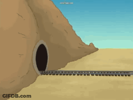 A Cartoon Of A Train Going Through A Tunnel In The Desert . GIF