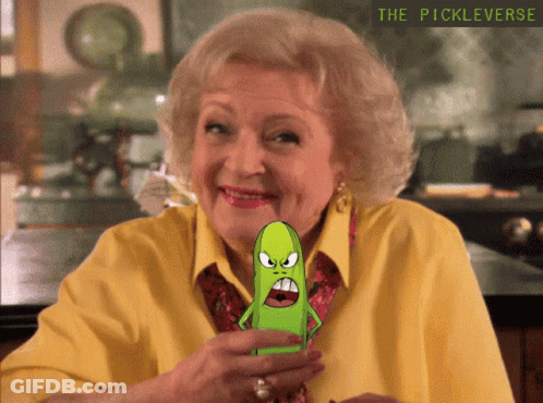 A Cartoon Of A Woman Holding A Pickle With The Words " The Pickleverse " Below Her GIF