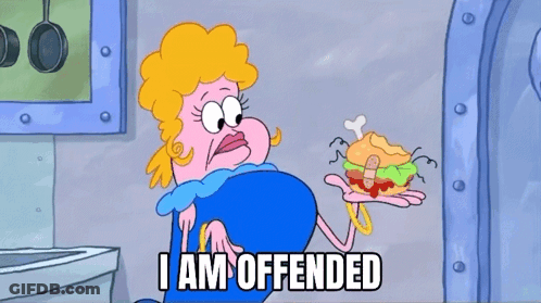 A Cartoon Of A Woman Holding A Sandwich With The Words " I Am Offended " Below Her GIF