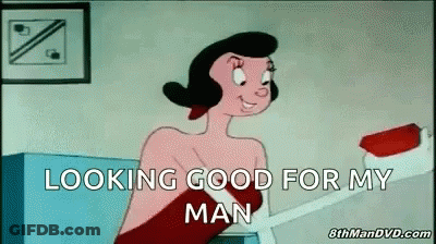 A Cartoon Of A Woman Holding A Toothbrush With The Words Looking Good For My Man Below Her GIF
