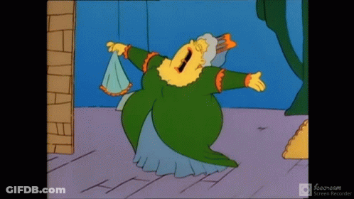 A Cartoon Of A Woman In A Green Dress Is Being Recorded GIF