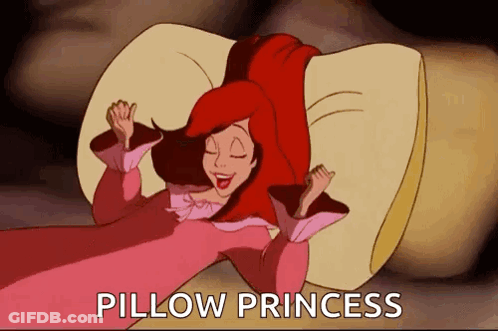 A Cartoon Of A Woman Laying On A Pillow With The Words Pillow Princess Written Above Her . GIF