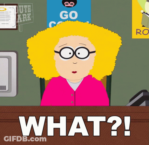 A Cartoon Of A Woman Sitting At A Desk With The Words " What ? " In Front Of Her GIF