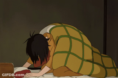 A Cartoon Of A Woman Sitting On A Bed GIF