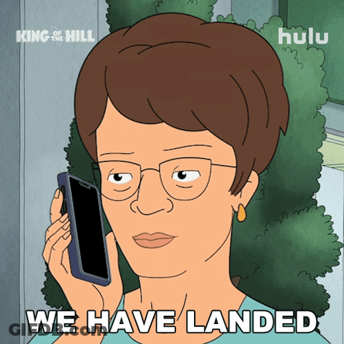 A Cartoon Of A Woman Talking On A Cell Phone With The Words " We Have Landed " Below Her GIF