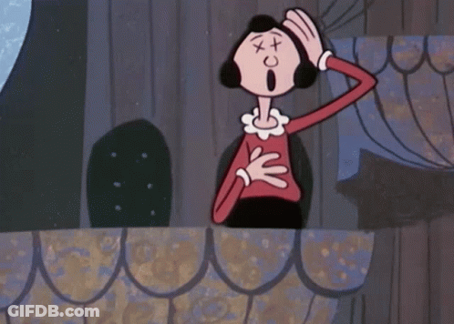 A Cartoon Of A Woman With A Cross On Her Forehead GIF