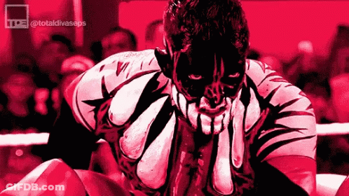 A Cartoon Of A Wrestler With His Hands On His Face In A Wrestling Ring . GIF