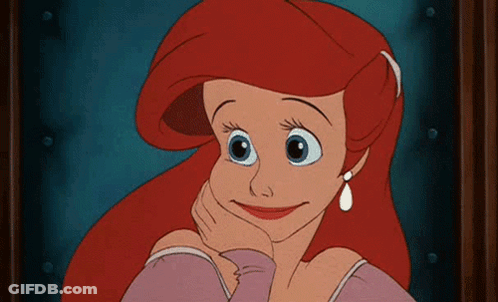 Ariel From Little Mermaid Smiling At Picture GIF