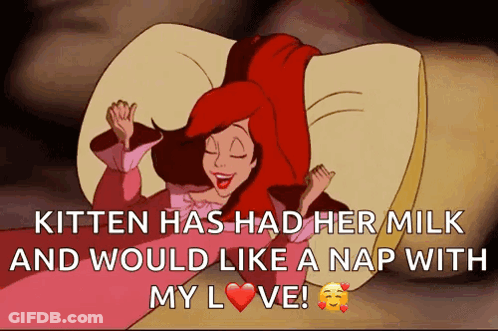 A Cartoon Of Ariel From The Little Mermaid Laying On A Bed GIF