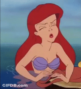 A Cartoon Of Ariel From The Little Mermaid Yawning In The Ocean . GIF