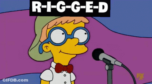 A Cartoon Of Bart Simpson Singing Into A Microphone With R-I-G-G-E-D Written Above Him GIF
