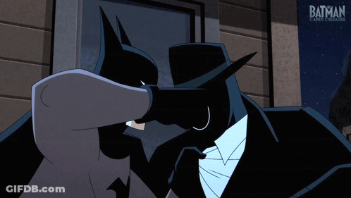 A Cartoon Of Batman And A Shadowy Figure Saying Pow GIF