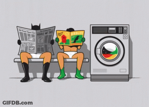 A Cartoon Of Batman And Robin Reading Newspapers Next To A Washer GIF