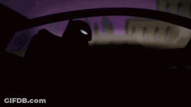 A Cartoon Of Batman Driving A Car With Wings . GIF
