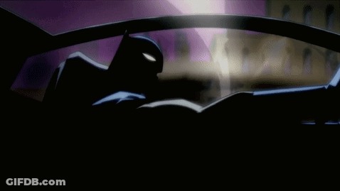 A Cartoon Of Batman In A Dark Room GIF