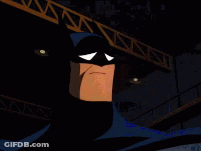 A Cartoon Of Batman Making A Sad Face In A Dark Room GIF