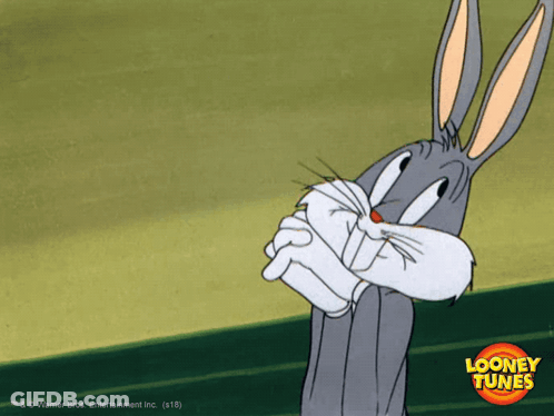 A Cartoon Of Bugs Bunny From Looney Tunes With A Green Background GIF