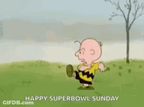 A Cartoon Of Charlie Brown And Lucy Brown Playing A Game Of Soccer . GIF