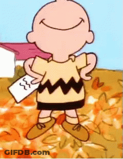 A Cartoon Of Charlie Brown Holding A Piece Of Paper With The Number 33 On It GIF