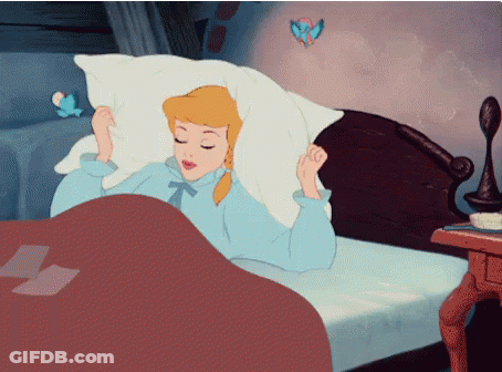 A Cartoon Of Cinderella Laying In Bed With Her Eyes Closed GIF
