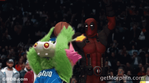 A Cartoon Of Deadpool Holding A Basketball Next To A Mascot With The Number 2000 On His Jersey GIF