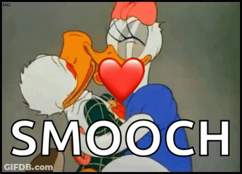 A Cartoon Of Donald Duck And Daisy Duck Kissing With The Words Smooch Written Below Them GIF
