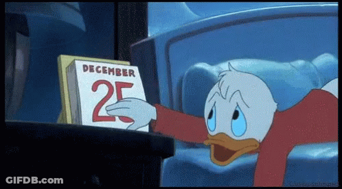 A Cartoon Of Donald Duck Looking At A Calendar That Says December 25 GIF
