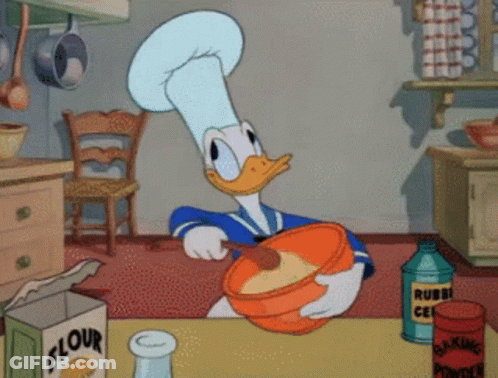A Cartoon Of Donald Duck Mixing Something In A Bowl With A Box Of Flour In The Background GIF