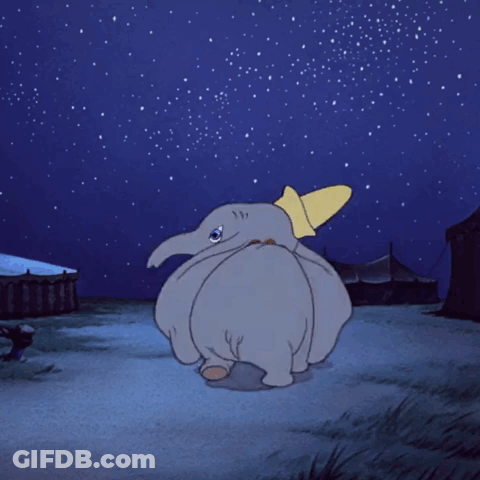 A Cartoon Of Dumbo Looking Up At The Sky GIF