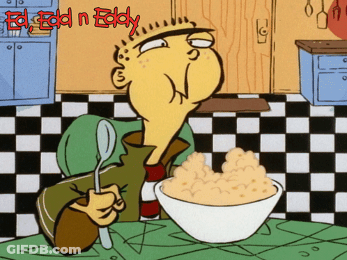 A Cartoon Of Ed Holding A Spoon And A Bowl Of Cereal With The Words Ed Edd N Eddy Above Him GIF