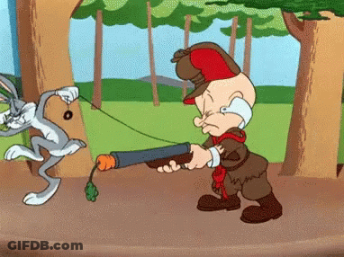 A Cartoon Of Elmer Fudd Holding A Carrot And Bugs Bunny GIF