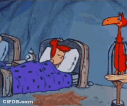 A Cartoon Of Flintstone Holding A Towel In Front Of A Sleeping Man And Woman . GIF