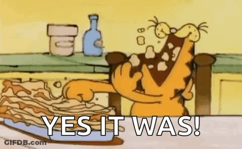 A Cartoon Of Garfield Eating A Pie With The Words `` Yes It Was ! '' GIF