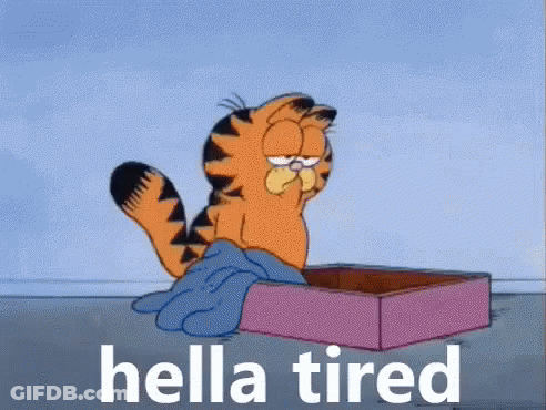 A Cartoon Of Garfield Laying In A Box With The Words Hella Tired Below Him . GIF