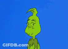 A Cartoon Of Grinch With A Very Angry Face On A Blue Background GIF