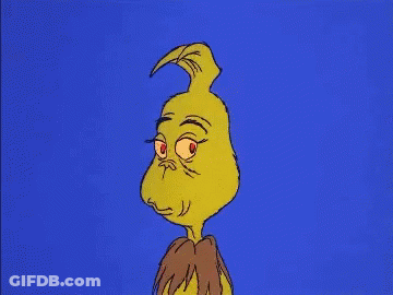 A Cartoon Of Grinch With A Very Angry Look On His Face Against A Blue Background . GIF