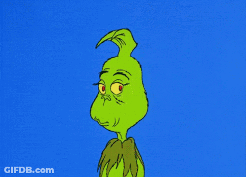 A Cartoon Of Grinch With A Very Angry Look On His Face GIF