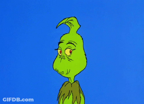 A Cartoon Of Grinch With A Very Angry Look On His Face GIF