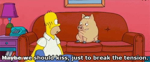 A Cartoon Of Homer Simpson And A Pig On A Couch With Maybe We Should Kiss Just To Break The Tension GIF